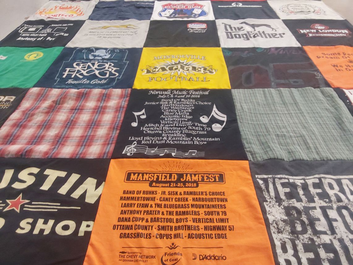 T-shirt quilt with music festivals, bluegrass themes by Allison from OH