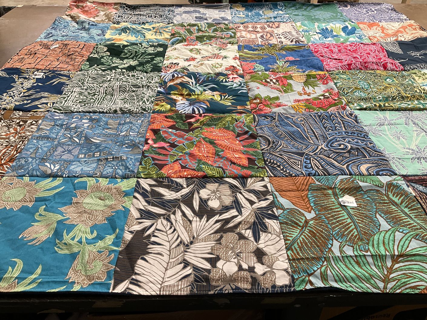 T-shirt quilt with quilting, textiles themes by Perry from CO