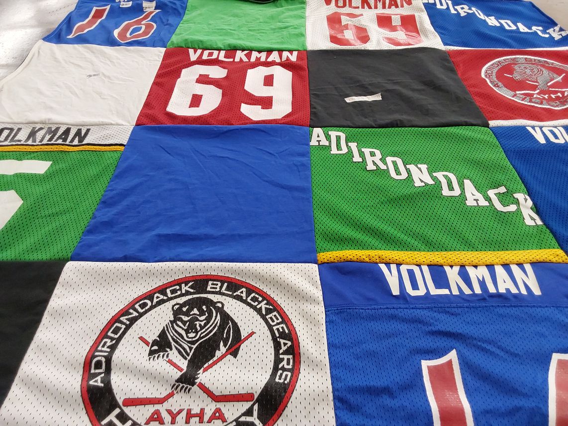 T-shirt quilt with hockey themes by Christine from NY