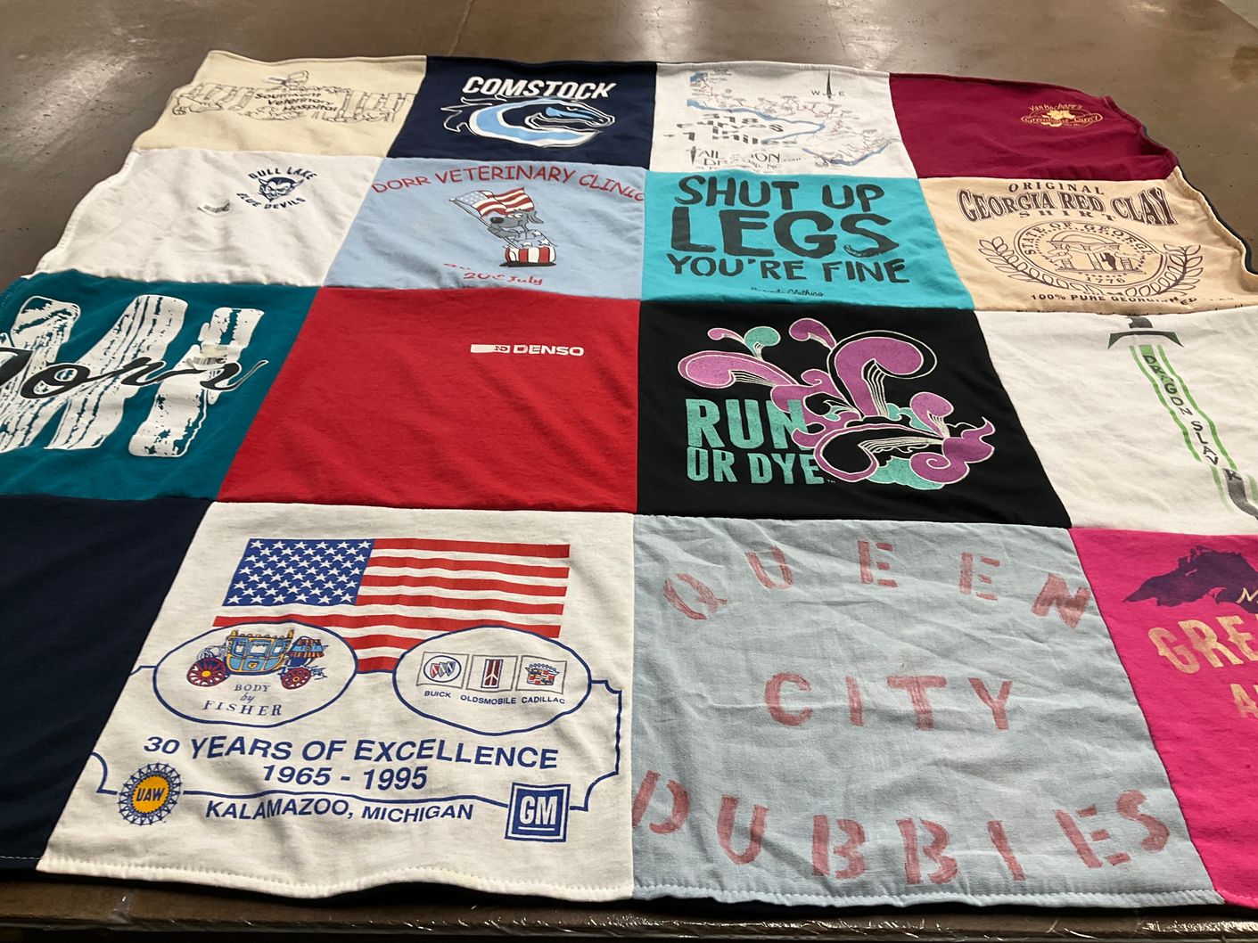 T-shirt quilt with animal care, running themes by Pamela from MI