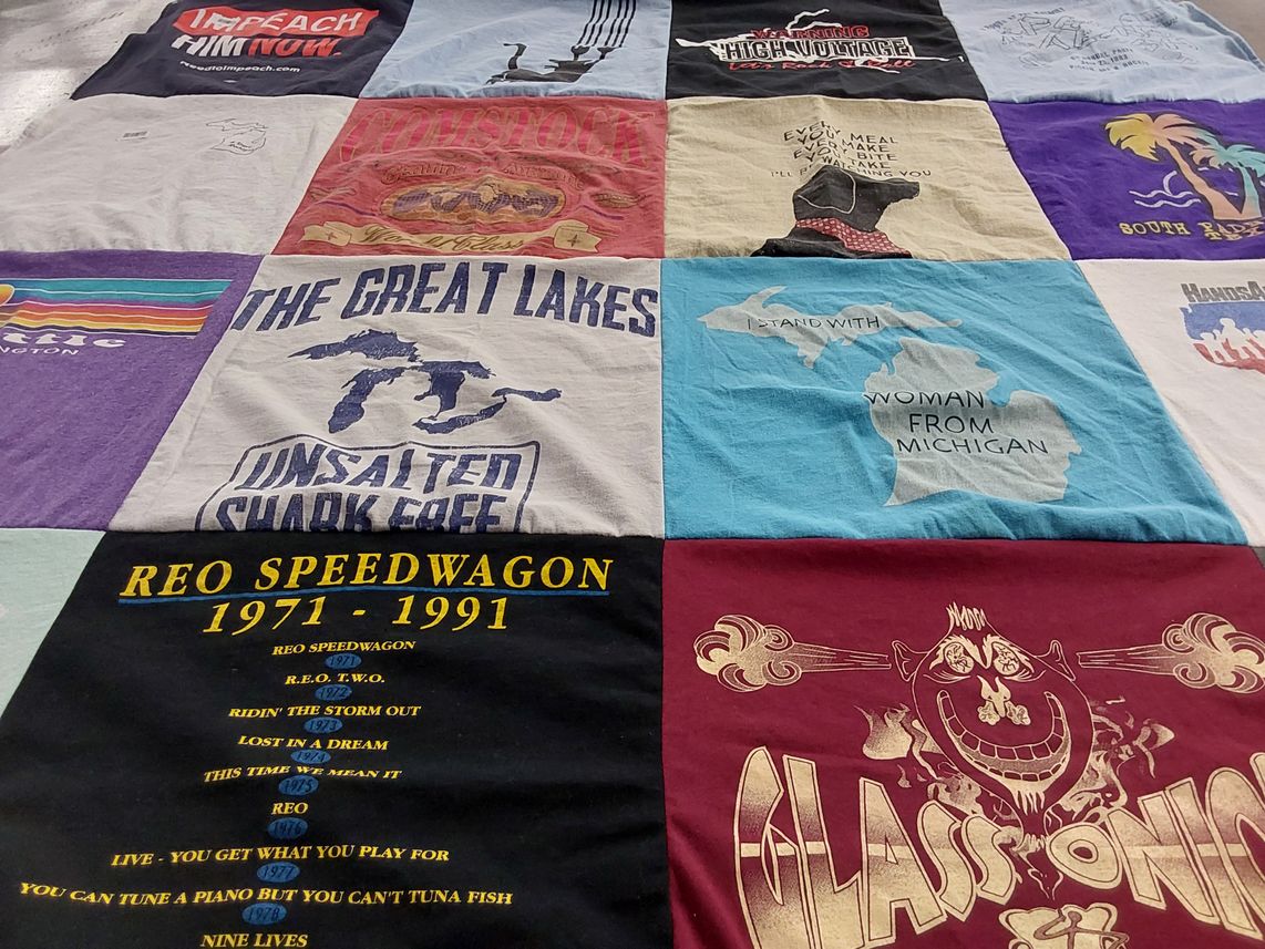 T-shirt quilt with music, politics themes by Pamela from MI