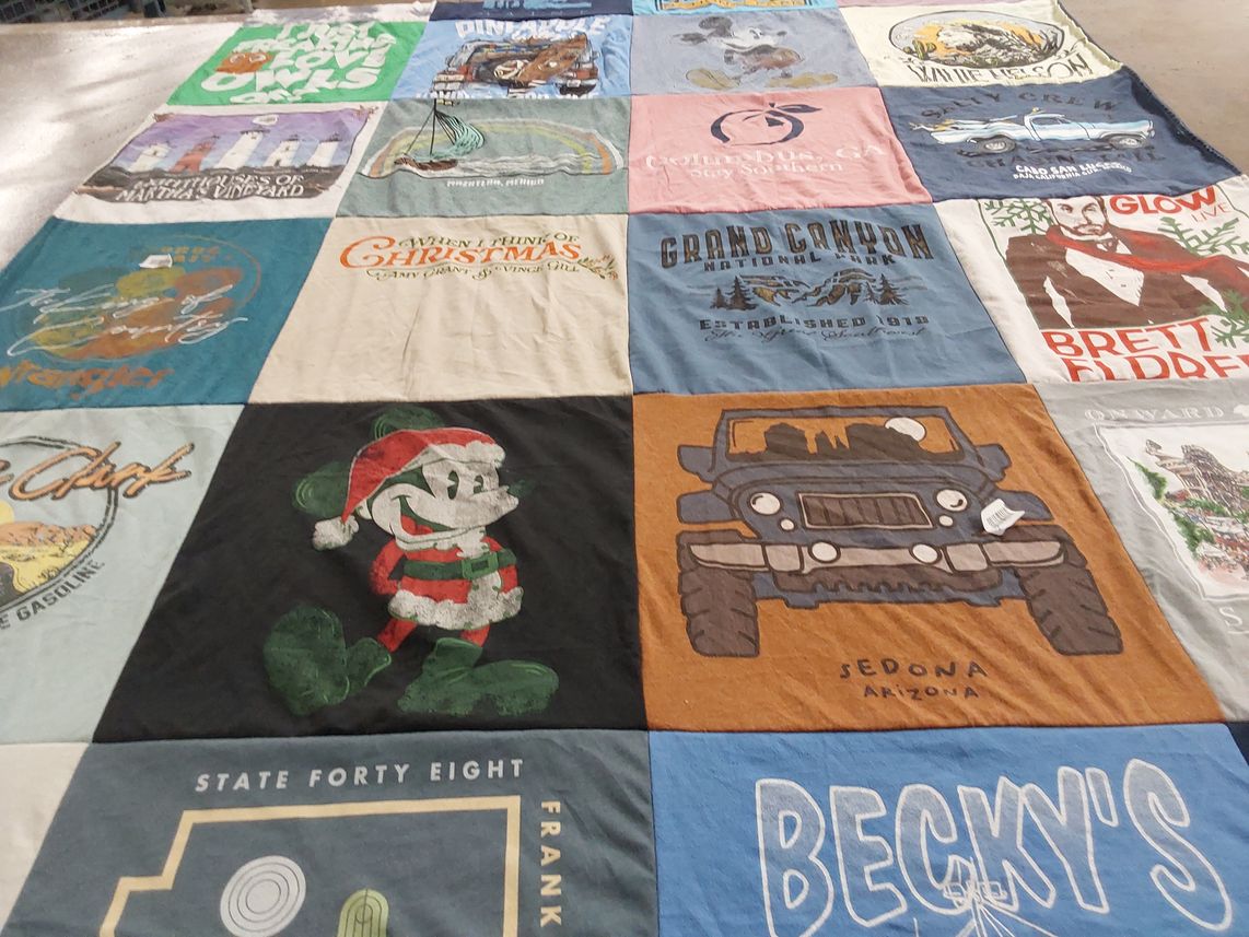 T-shirt quilt with travel, holidays themes by Tabitha from TX