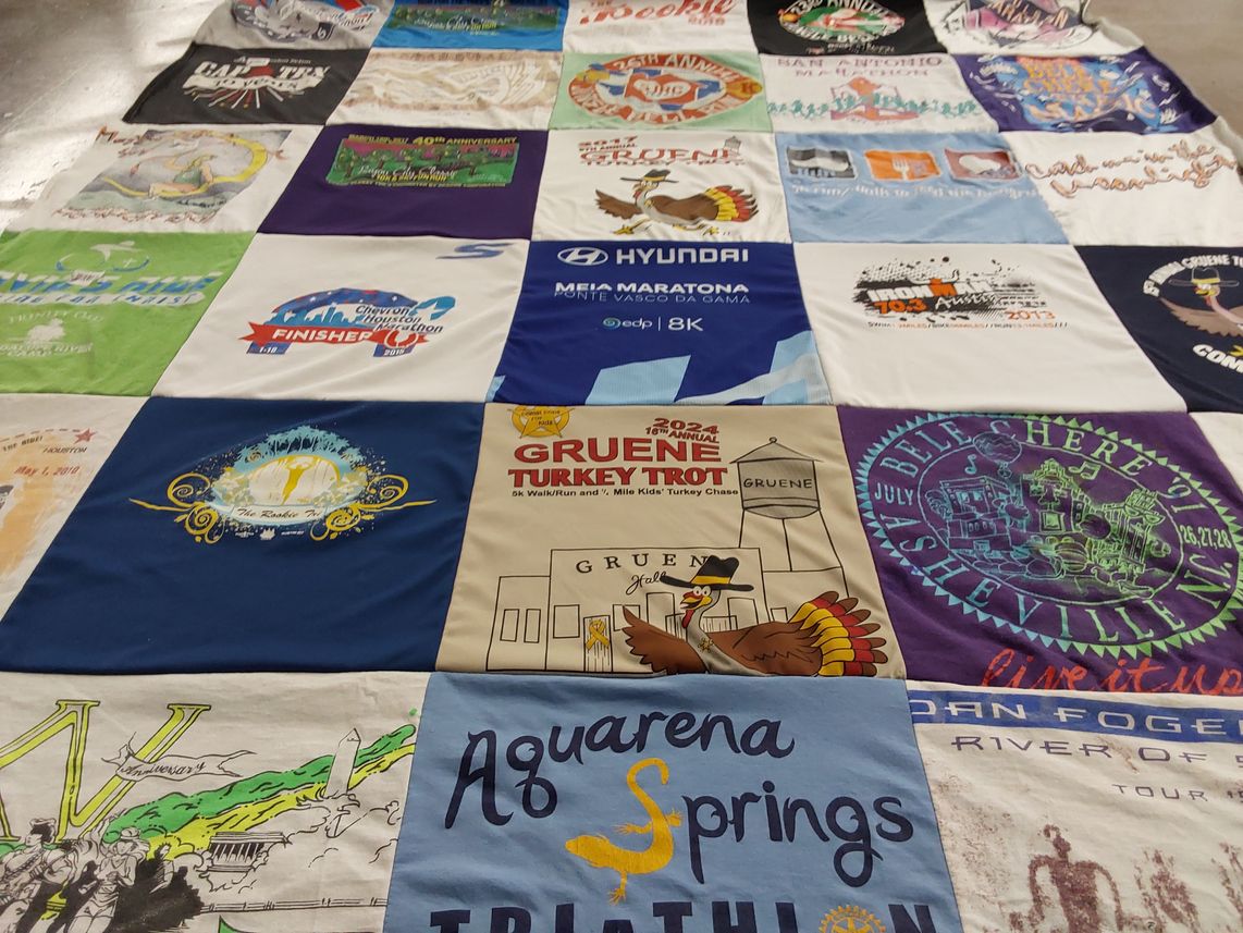 T-shirt quilt with running, triathlons themes by Susan from TX