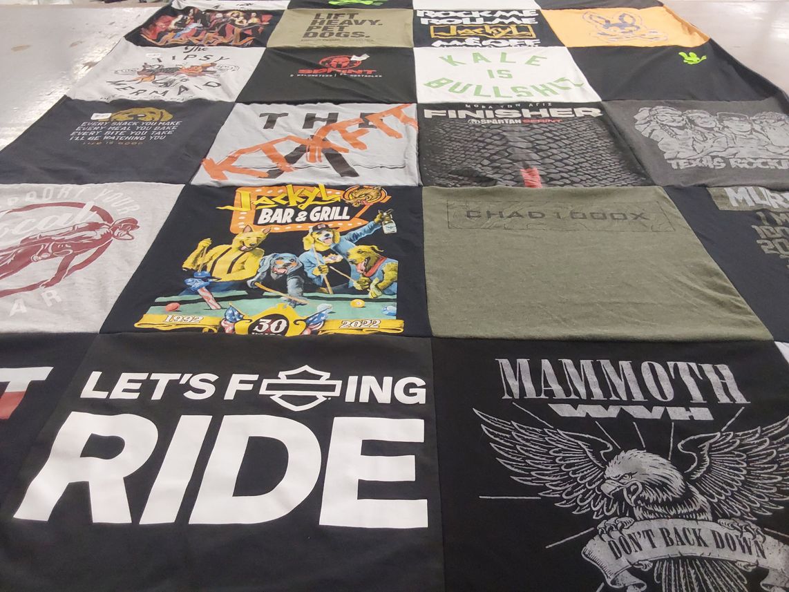 T-shirt quilt with food, fitness themes by Lynette from TX