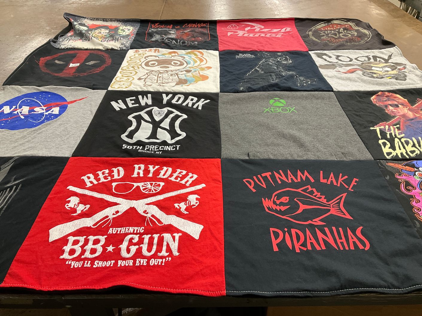 T-shirt quilt featuring putnam lake piranhas by Karen from NY