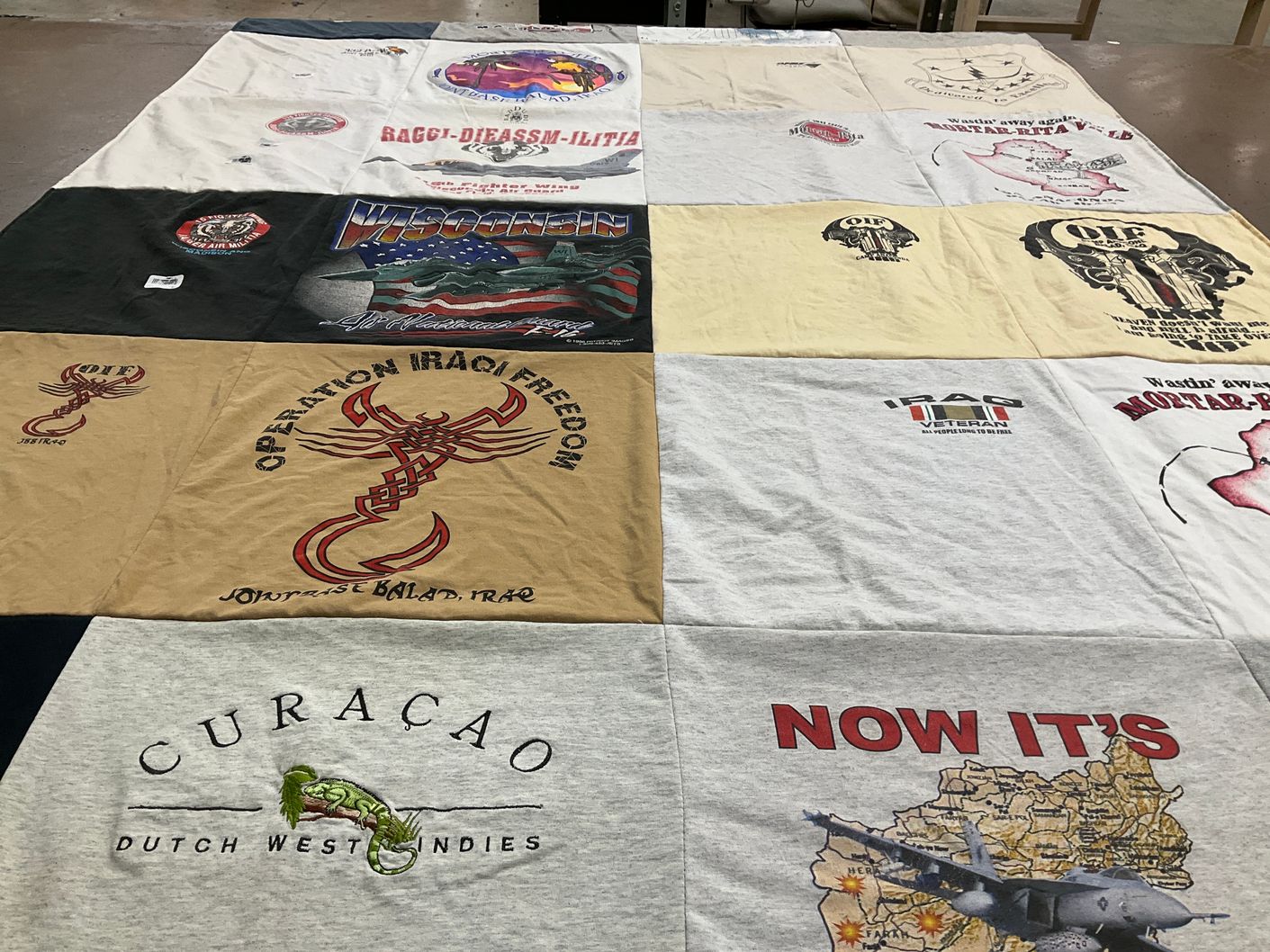 T-shirt quilt with military, travel themes by Taralynn from WI