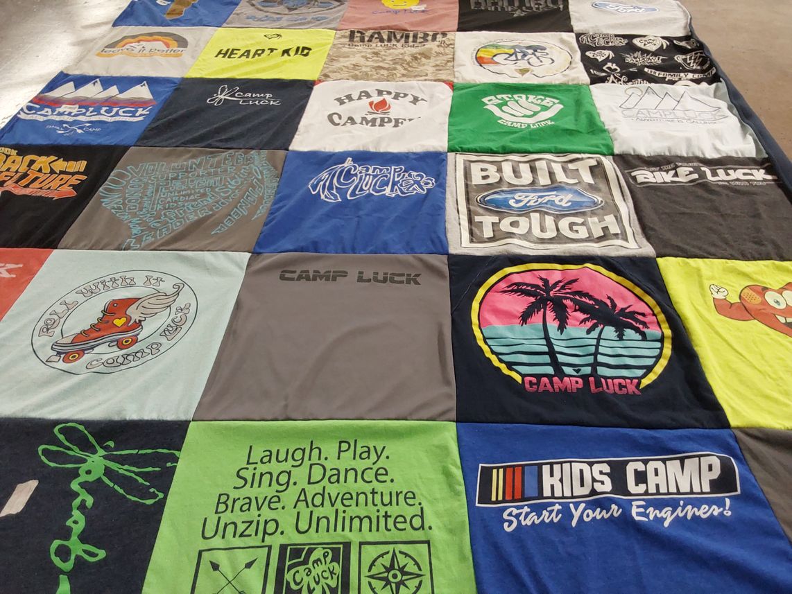 T-shirt quilt with camping, children's activities themes by Adrienne from NC