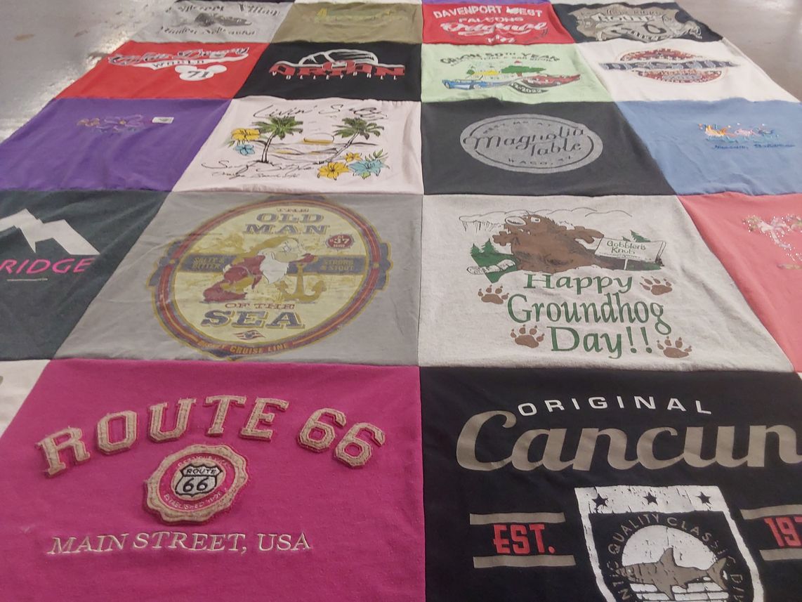 T-shirt quilt with travel, nature themes by Joyce from IL