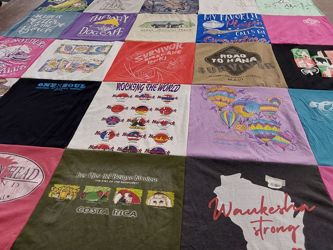 T-shirt quilt with travel, ballooning themes by Judith from WI