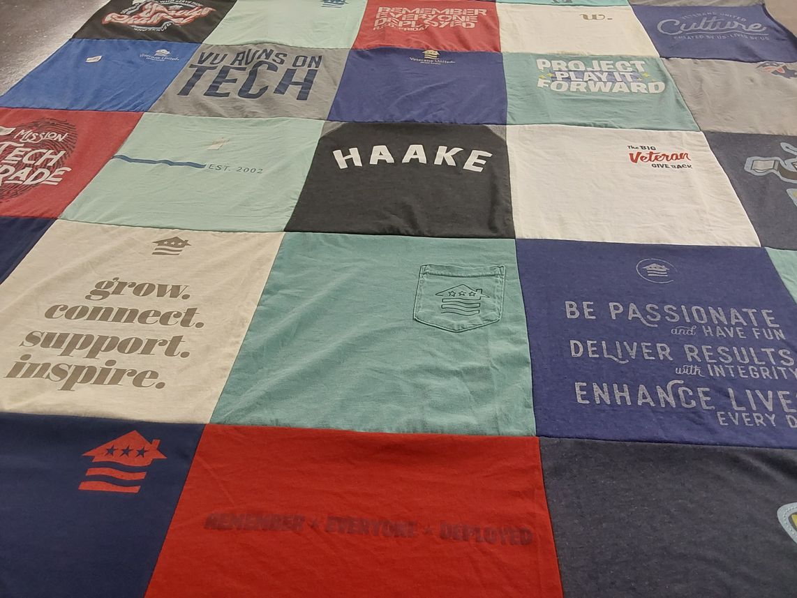 T-shirt quilt with technology, community service themes by Rhonda from MO