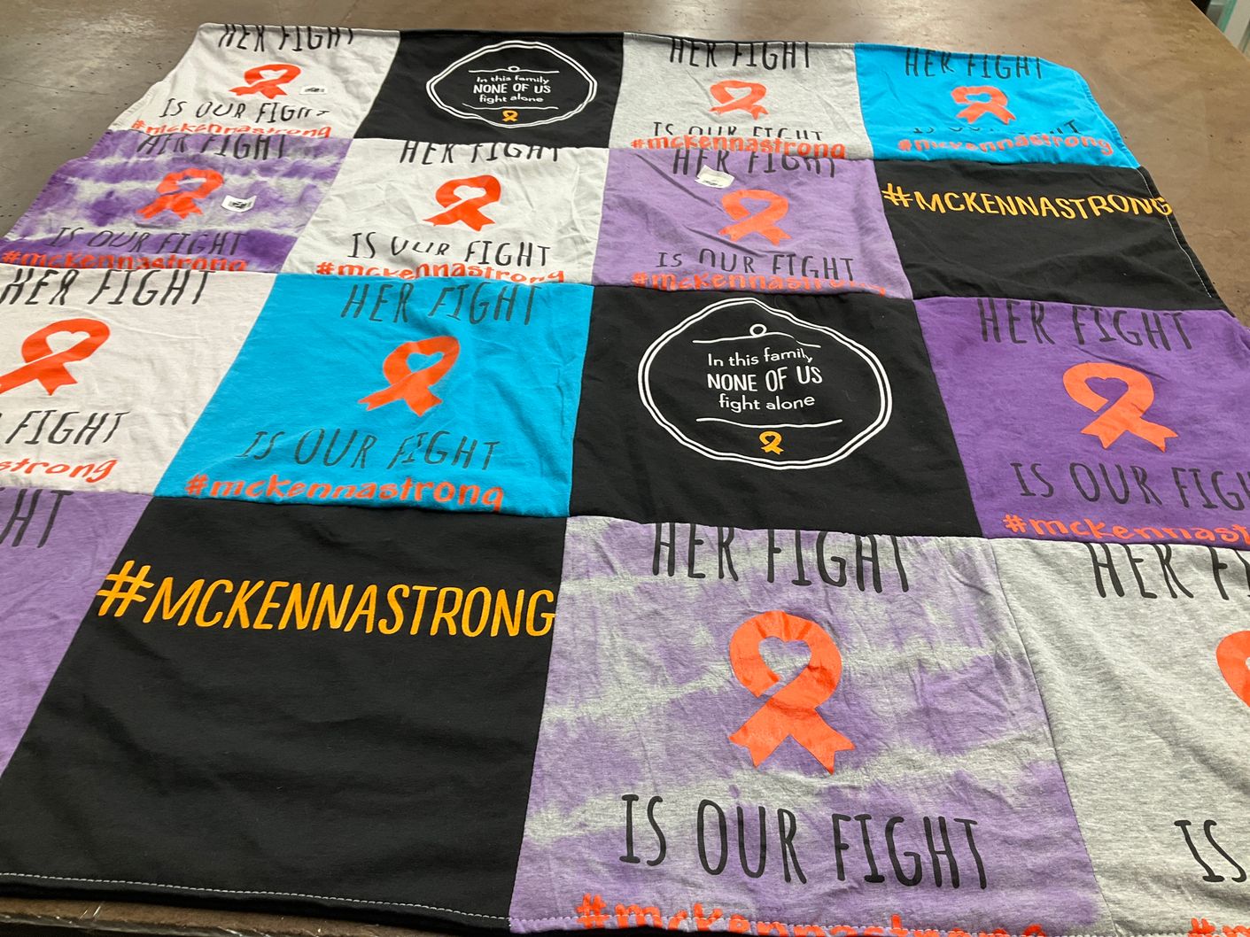 T-shirt quilt with support, awareness themes by Eugene from FL