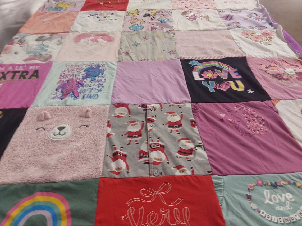 T-shirt quilt with cute characters, festive themes by Susan from NJ