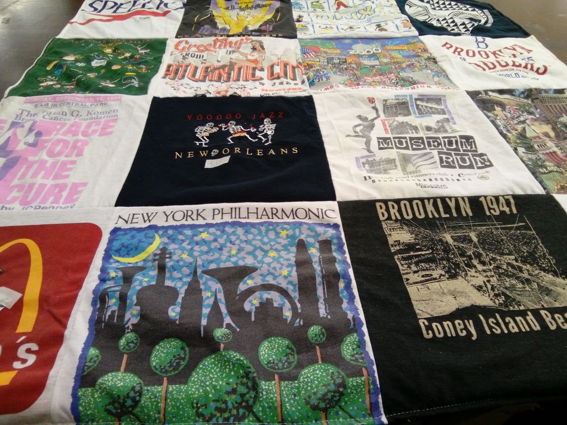 T-shirt quilt with cultural events, jazz music themes by Judith from NY