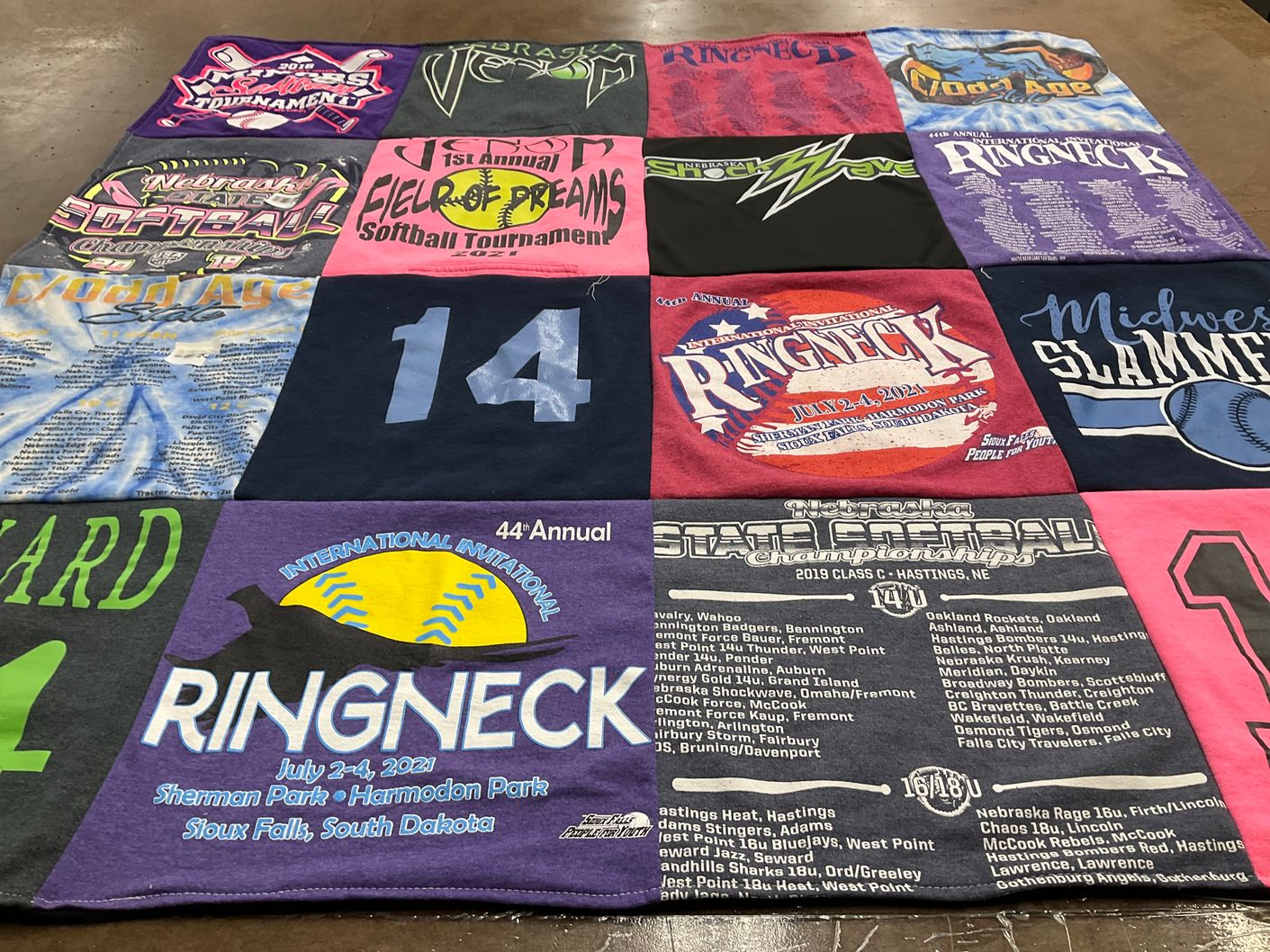 T-shirt quilt with softball, sports themes by Madelin from IA