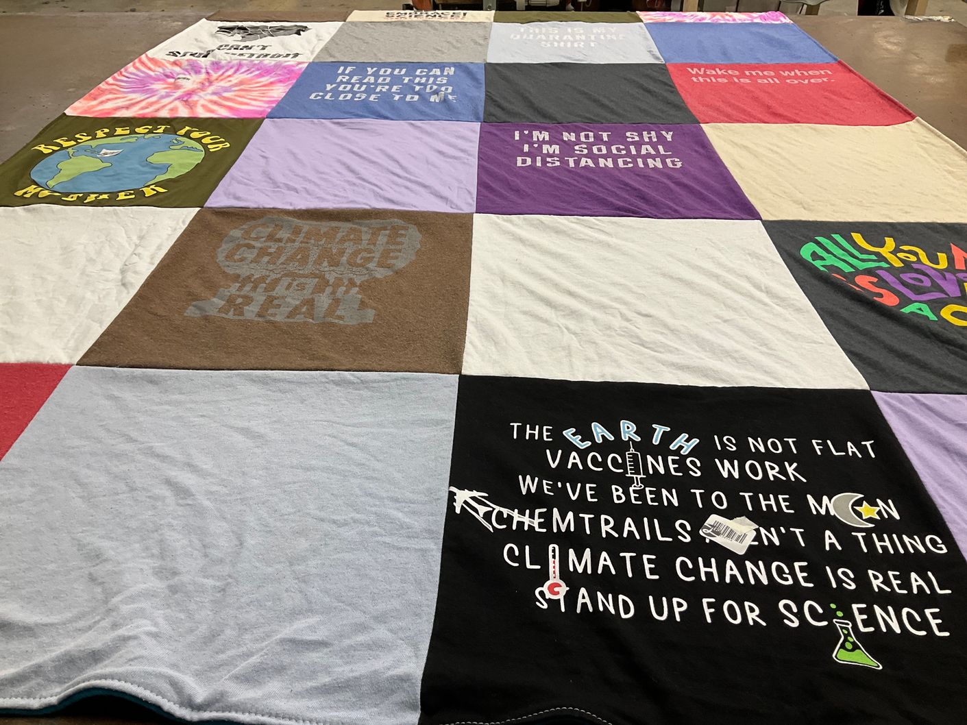 T-shirt quilt with climate activism, science communication themes by Anastasia from MI