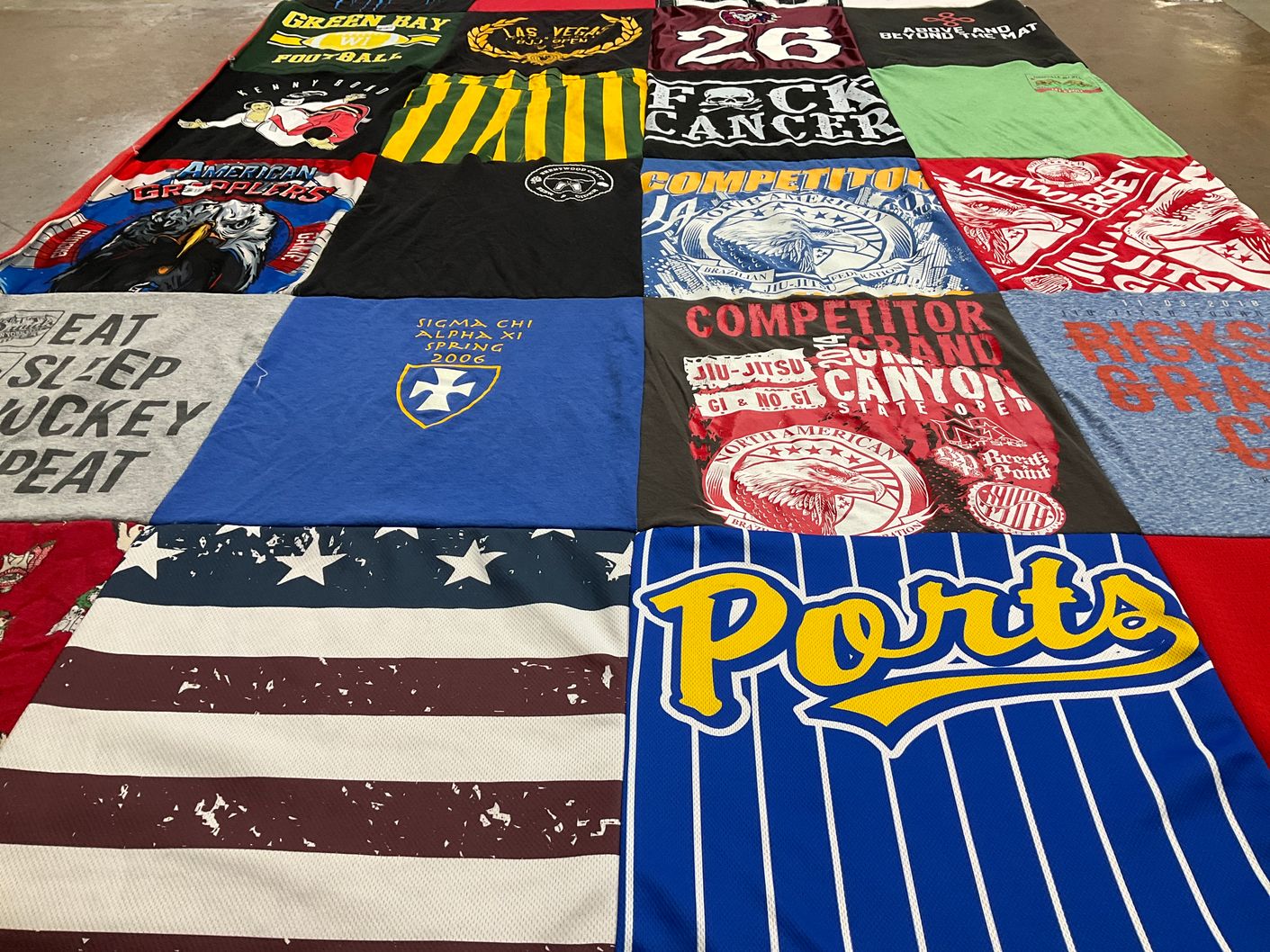 T-shirt quilt with football, jiu jitsu themes by Brittany from CA
