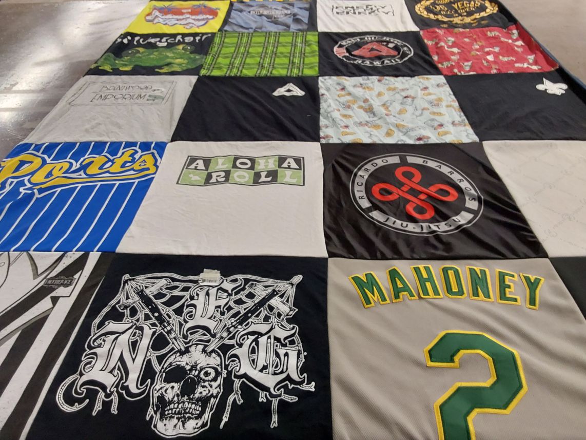 T-shirt quilt with martial arts, sports themes by Brittany from CA