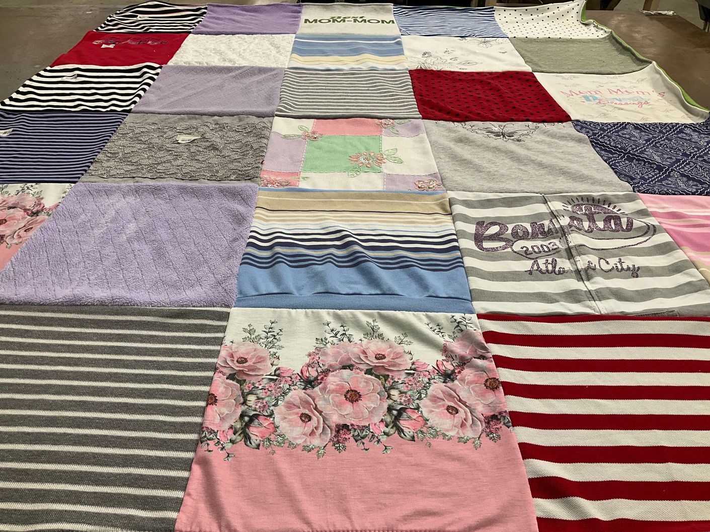 T-shirt quilt with family, travel themes by Kristine from NJ