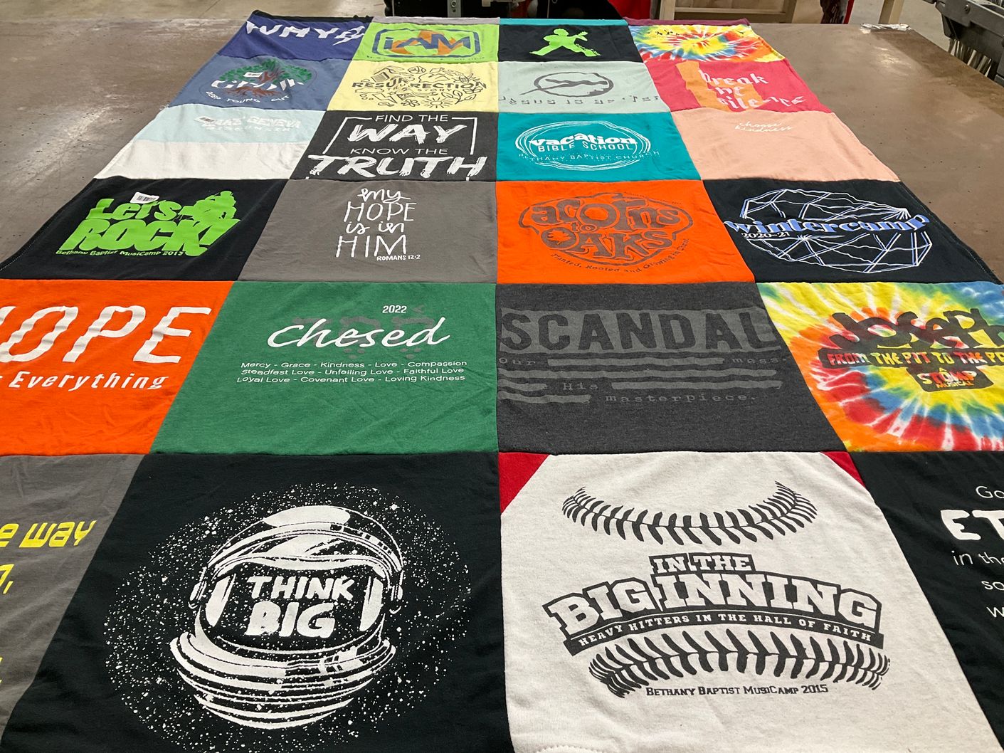 T-shirt quilt with faith, music themes by Dawn from IL