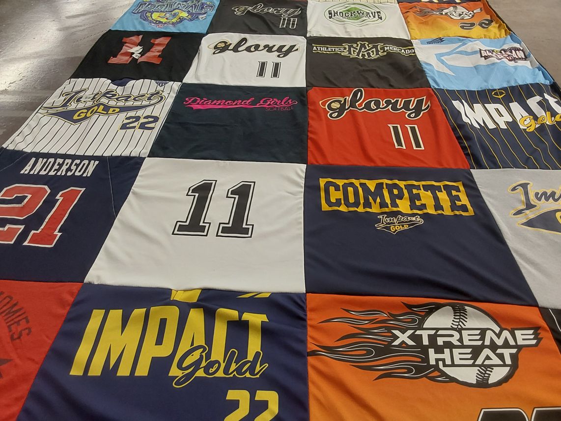T-shirt quilt with softball, sports themes by Iliani from TX
