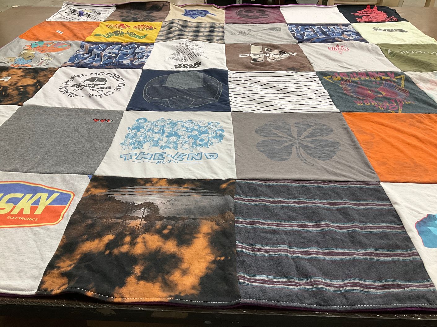 T-shirt quilt with motorcycles, electronics themes by Daniel from NY