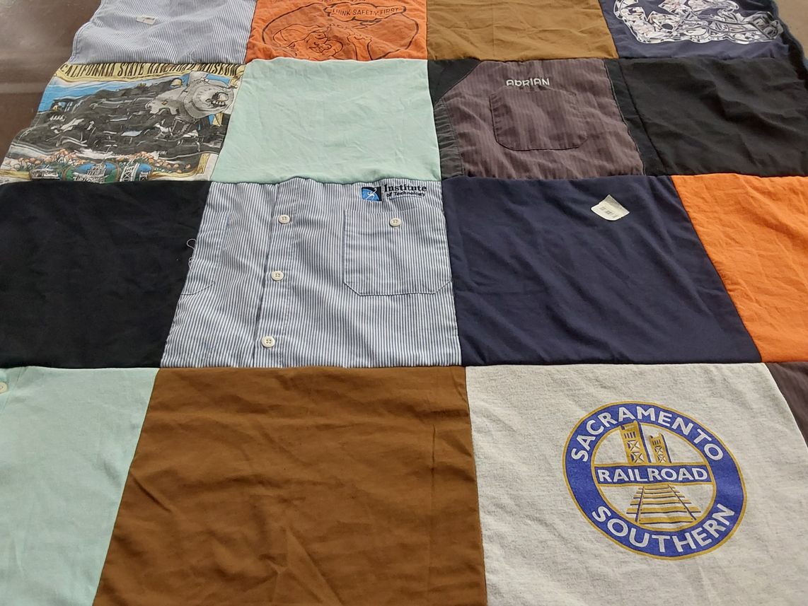 T-shirt quilt with railroads, travel themes by Lori from CA