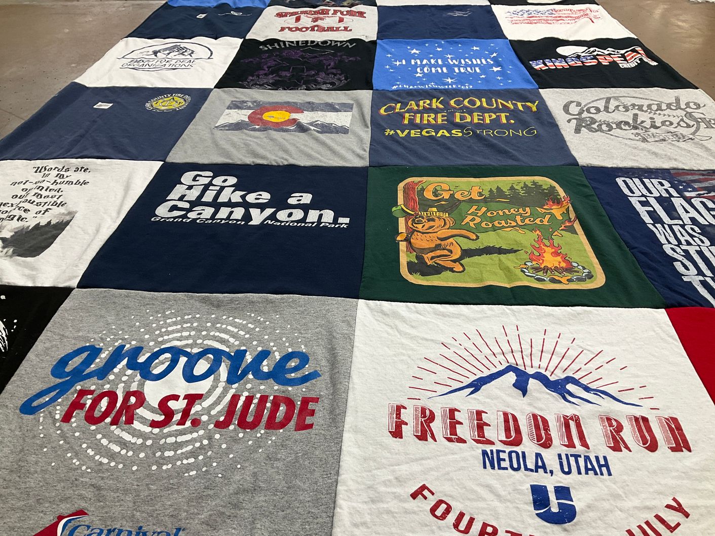 T-shirt quilt with hiking, music themes by Ashley from UT