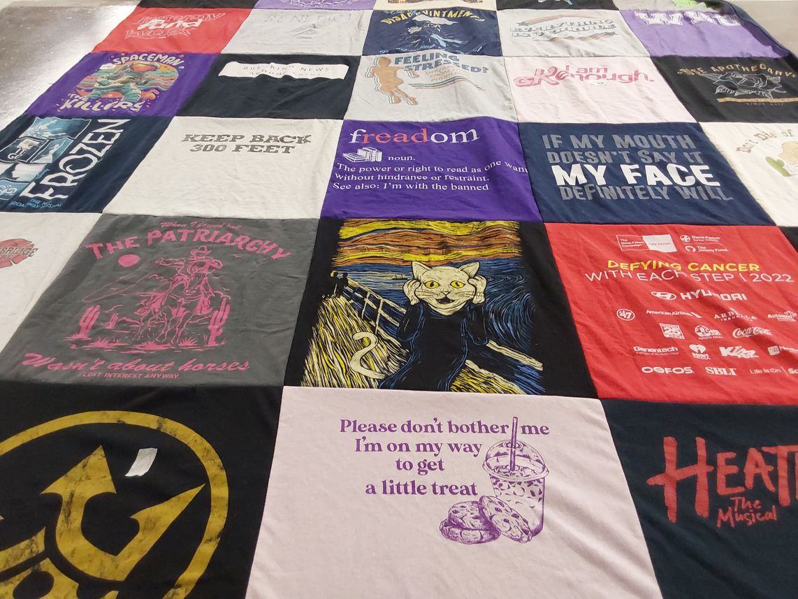 T-shirt quilt with social justice, theater themes by Claire from MA