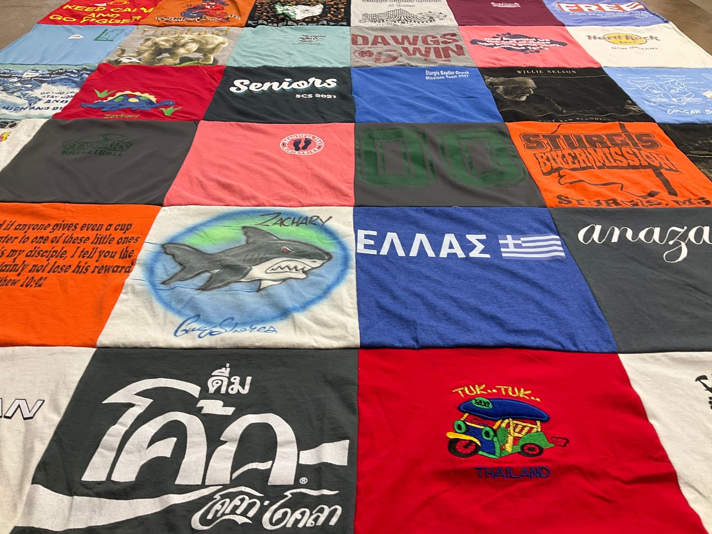 T-shirt quilt with travel, music themes by Summer from MS