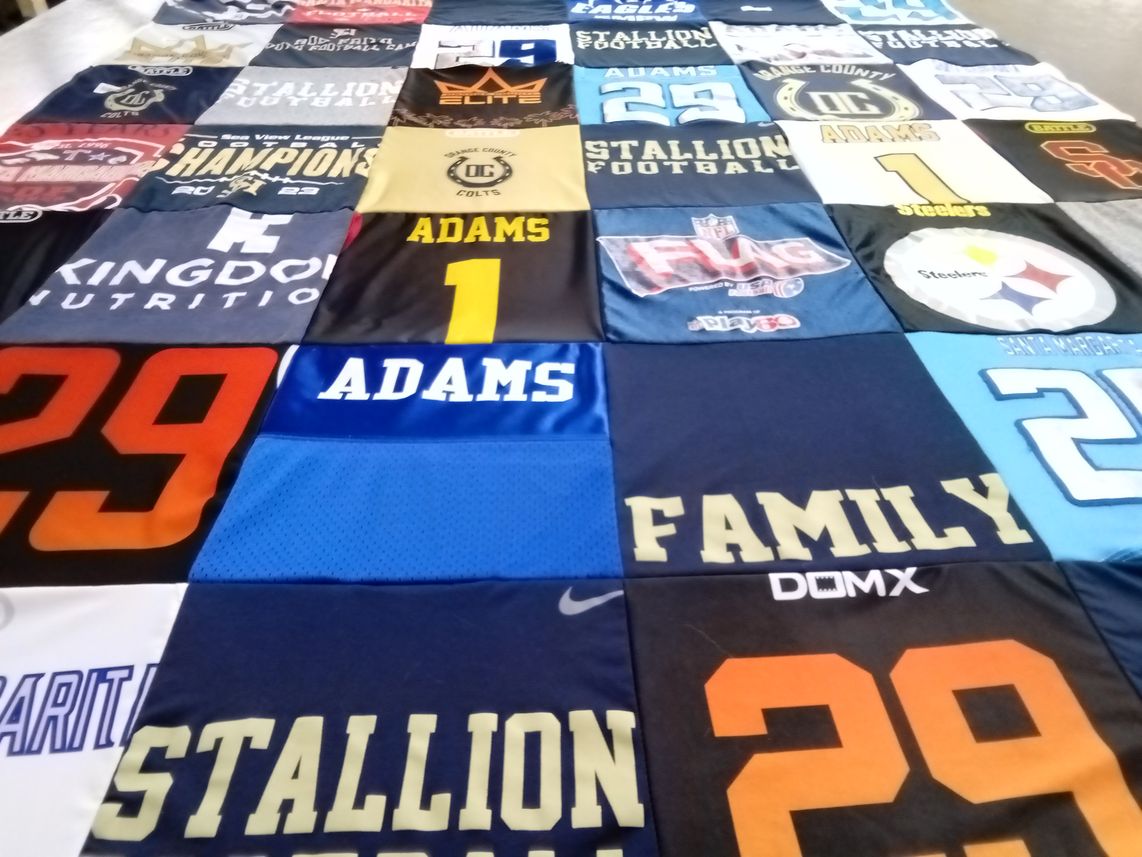 T-shirt quilt featuring stallion football by Kimberly from CA