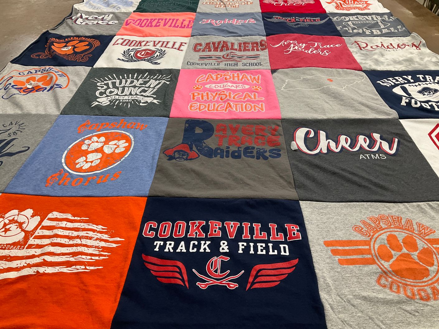 T-shirt quilt featuring cookeville high school track, capshaw cougars by Kristen from TN