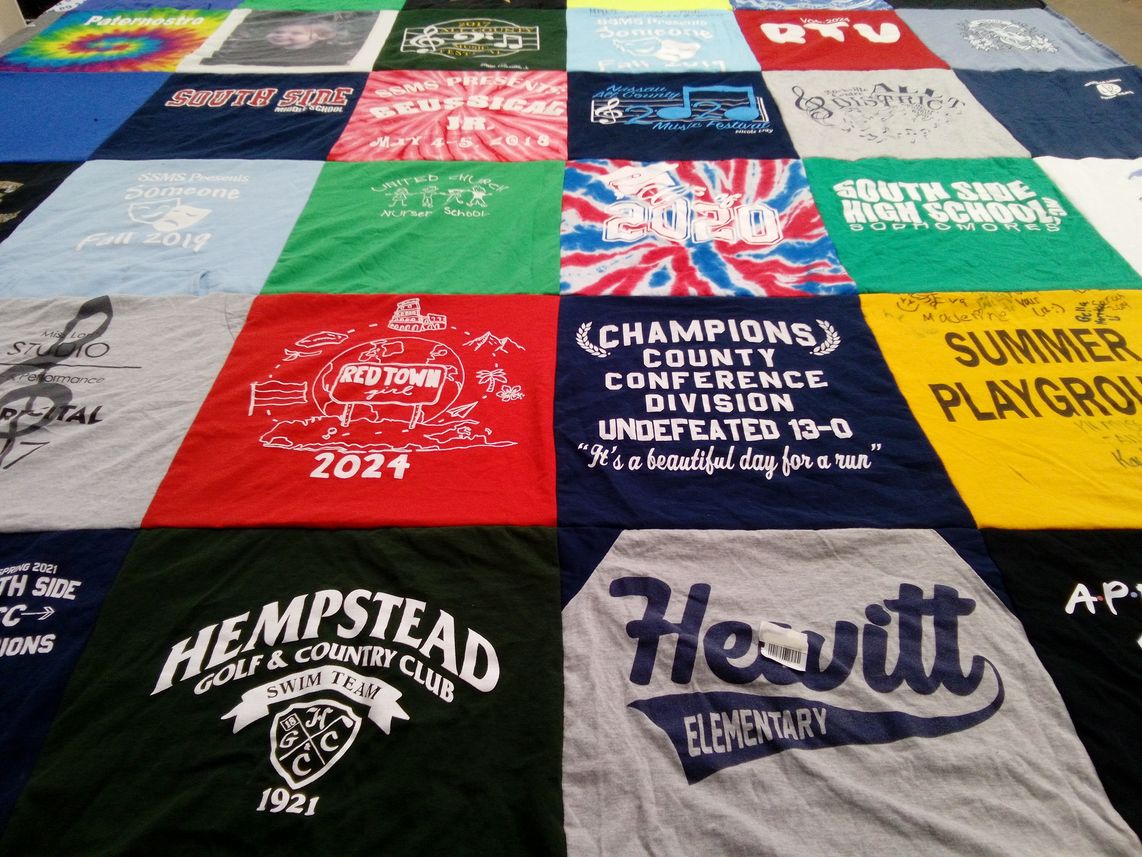 T-shirt quilt featuring south side swim team by Jane from NY