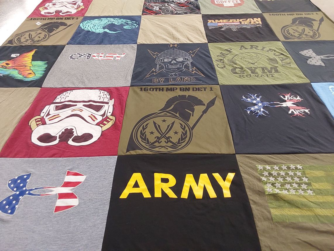 T-shirt quilt with military, fitness themes by Carolena from FL