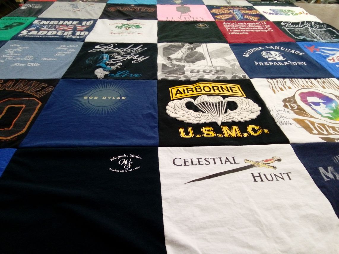 T-shirt quilt with music, firefighting themes by Linda from AZ