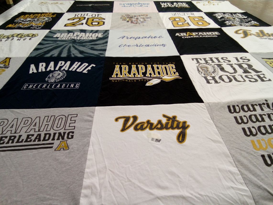 T-shirt quilt featuring arapahoe cheerleading by Danielle from CO