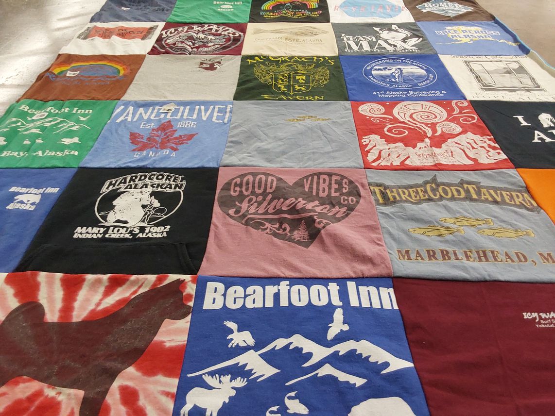 T-shirt quilt with travel, outdoors themes by Elizabeth from AK