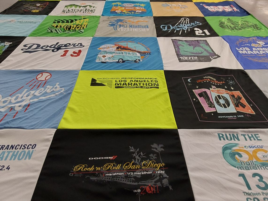 T-shirt quilt with running, sports themes by Timothy from CA