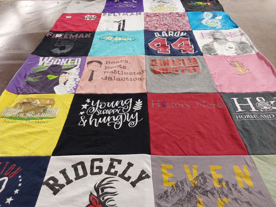 T-shirt quilt with theater, tv shows themes by Amy from MD