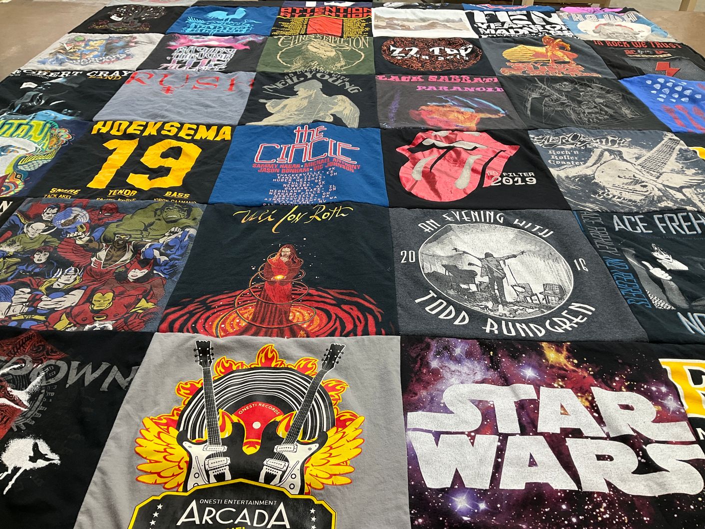 T-shirt quilt with music, rock themes by JOHN from WI