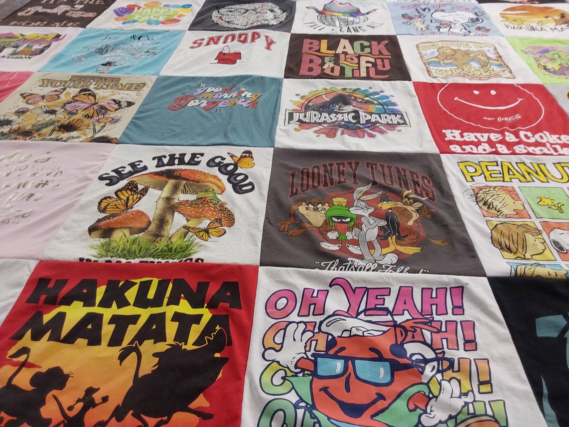 T-shirt quilt with cartoons, nature themes by Kimberly from TX