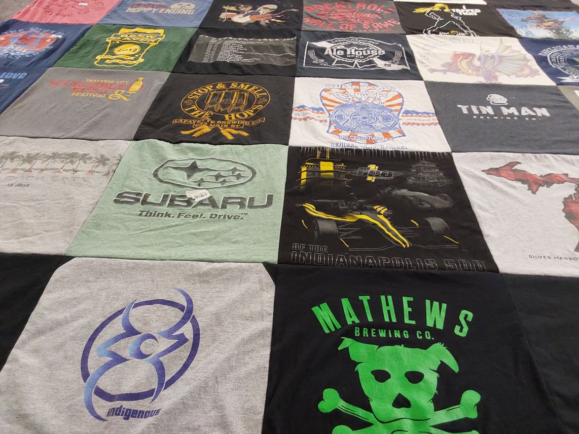 T-shirt quilt with beer, festivals themes by Judith from MI