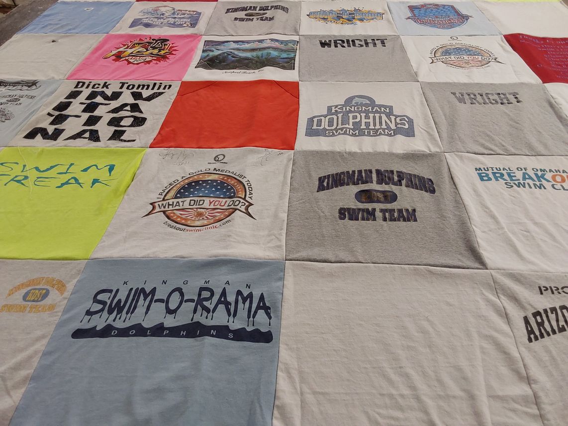 T-shirt quilt featuring kingman dolphins swim team by Darla from AZ