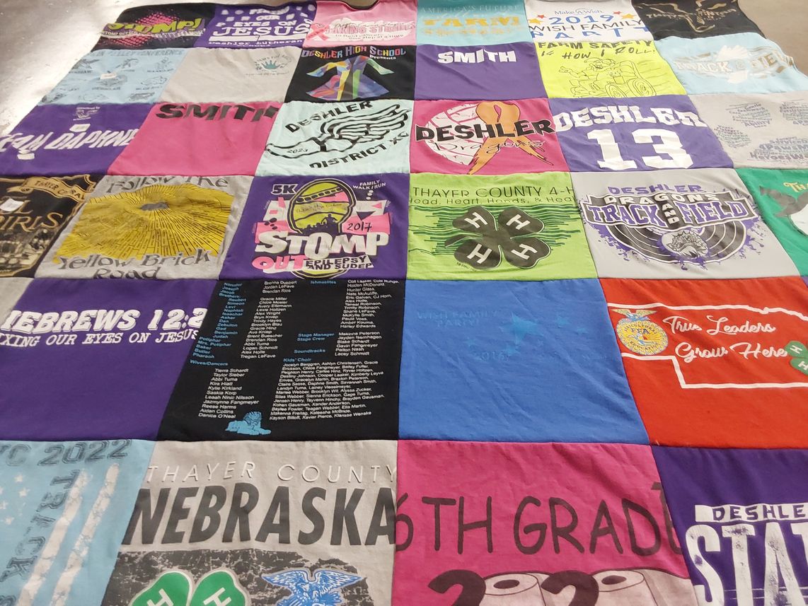 T-shirt quilt featuring deshler dragon track field by Shelly from NE