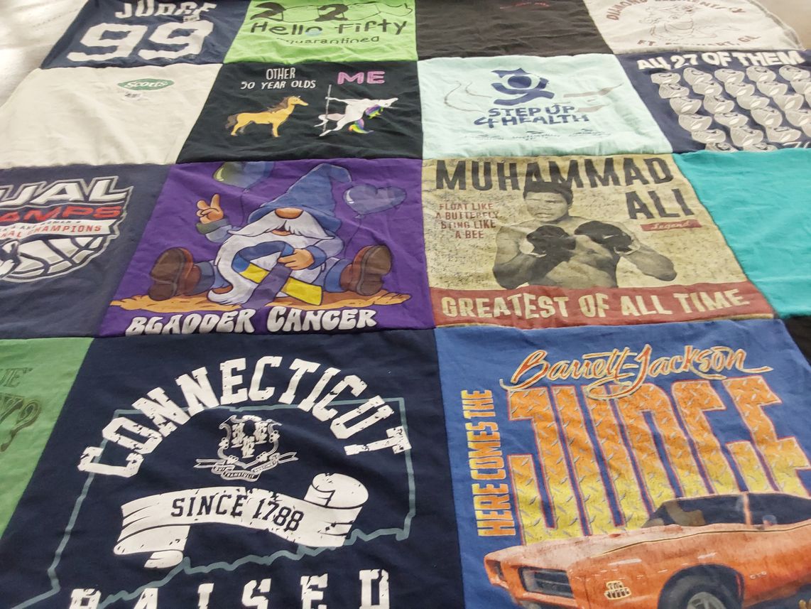 T-shirt quilt with health, sports themes by Heather from CO