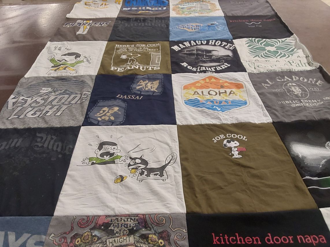 T-shirt quilt with travel, beverages themes by Hugh from HI