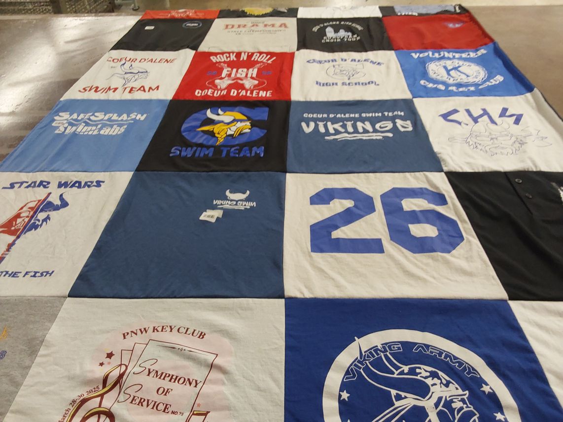 T-shirt quilt featuring coeur d'alene swim team by Andrea from ID