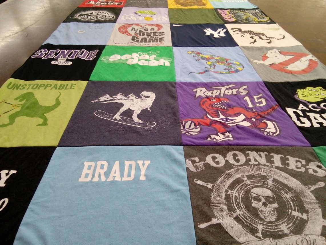 T-shirt quilt featuring raptors by Leah from AR