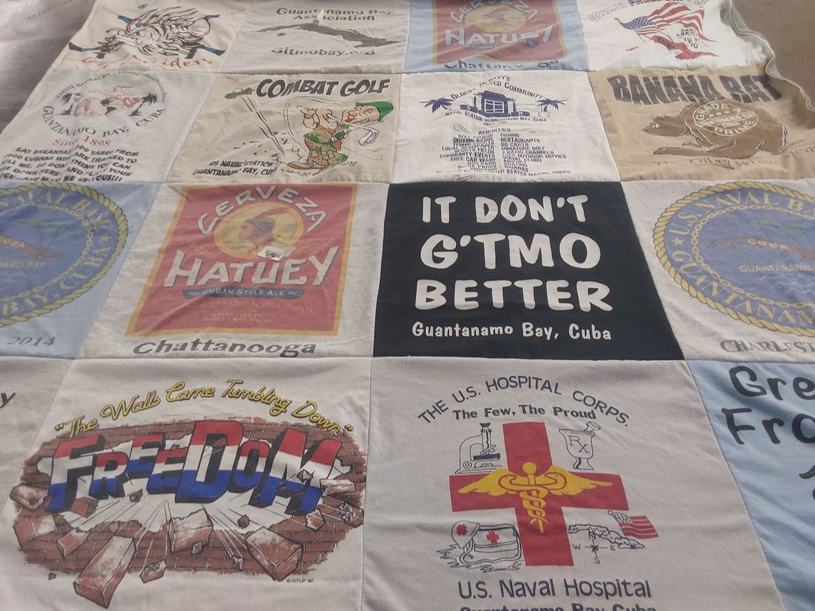 T-shirt quilt with military, beverages themes by Shelia from OH
