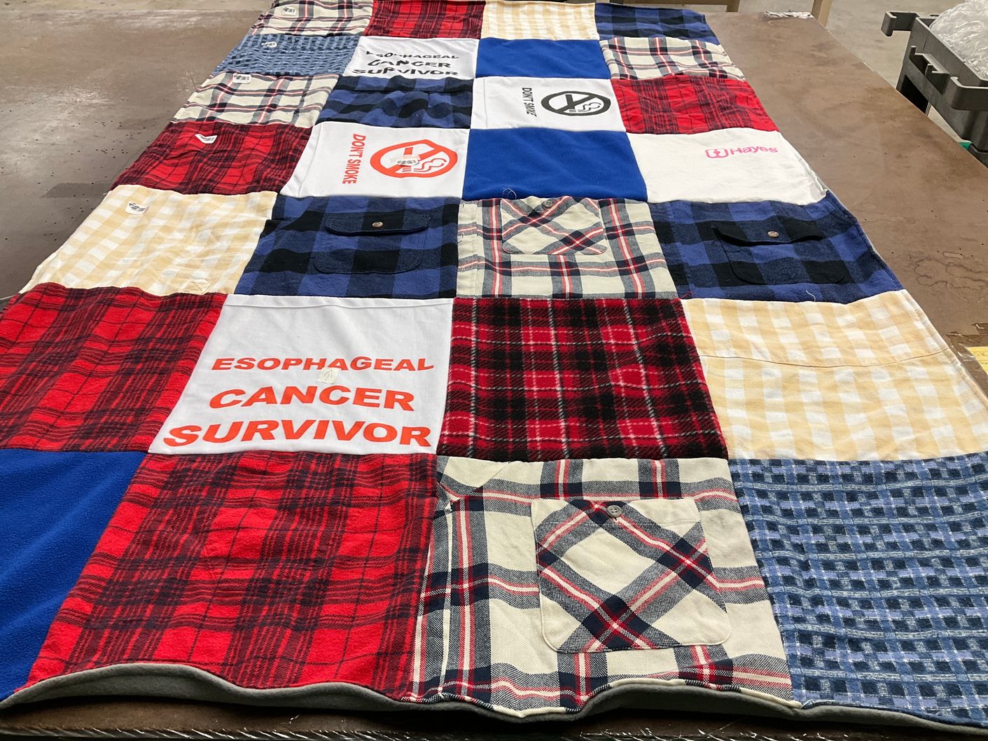 T-shirt quilt with health awareness, survivorship themes by Shemida from CA