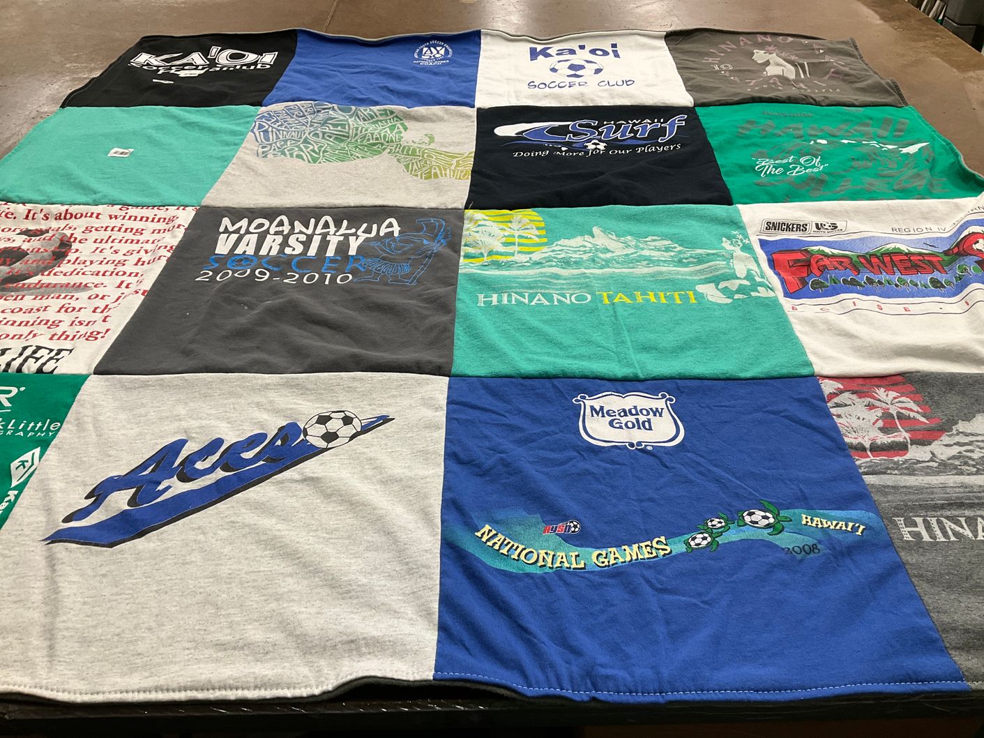 T-shirt quilt featuring moanalua varsity soccer, hinano tahiti by Thalia from CA